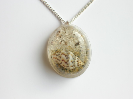 Ashes and seashell memorial pendant